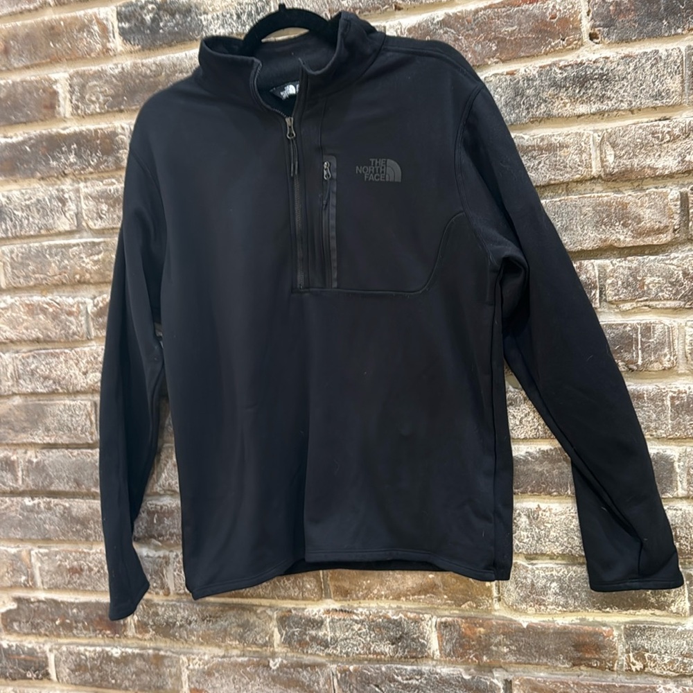 Black North Face quarter zip. Size medium